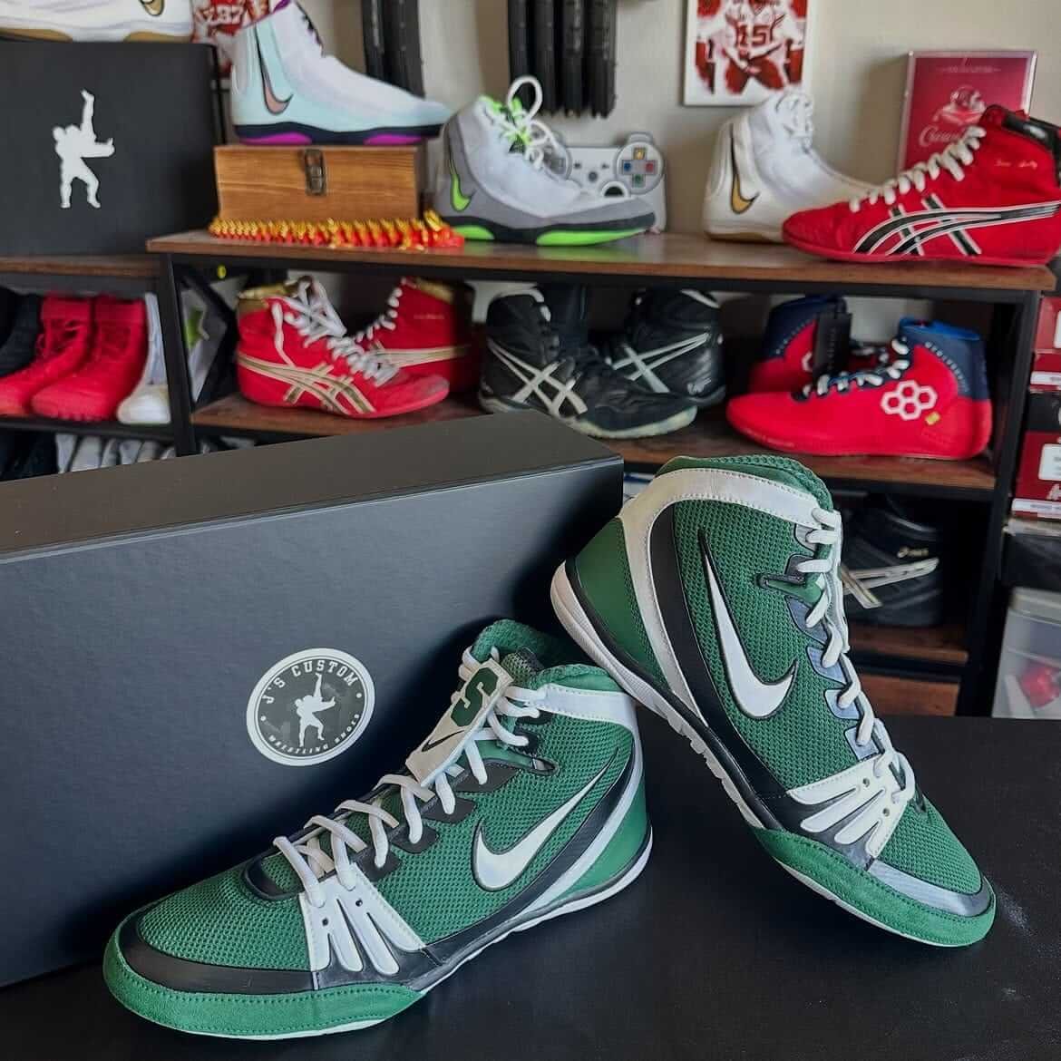 Custom hand-painted wrestling shoes in green and white colorway